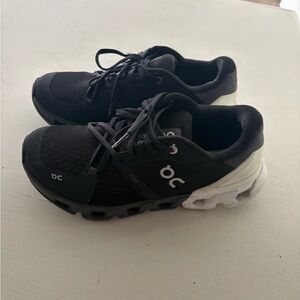 On cloud black and white sneakers